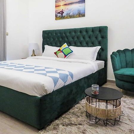 Oyo 860 Studio Apartment, Maya Tower 4, Jumeirah Village Triangle Дубай Экстерьер фото
