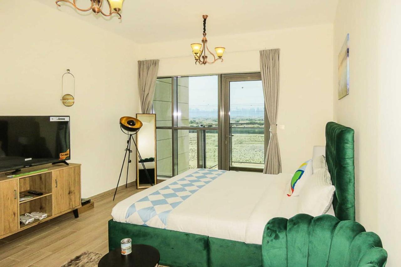 Oyo 860 Studio Apartment, Maya Tower 4, Jumeirah Village Triangle Дубай Экстерьер фото