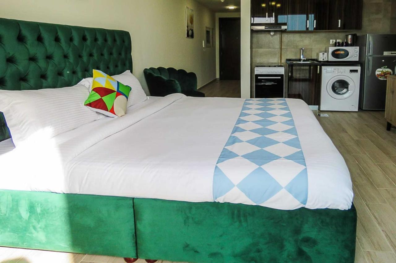 Oyo 860 Studio Apartment, Maya Tower 4, Jumeirah Village Triangle Дубай Экстерьер фото