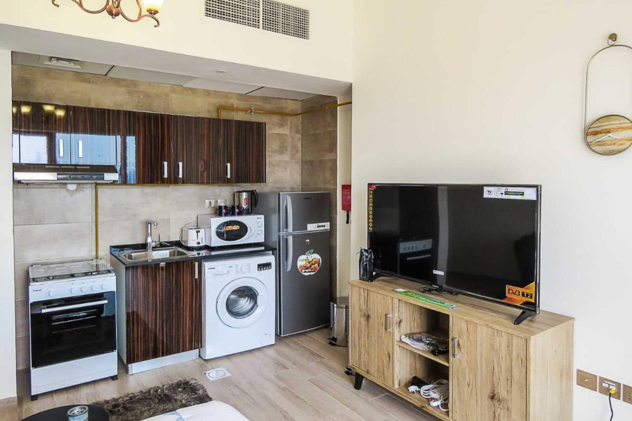 Oyo 860 Studio Apartment, Maya Tower 4, Jumeirah Village Triangle Дубай Экстерьер фото