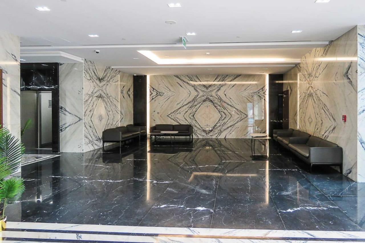 Oyo 860 Studio Apartment, Maya Tower 4, Jumeirah Village Triangle Дубай Экстерьер фото