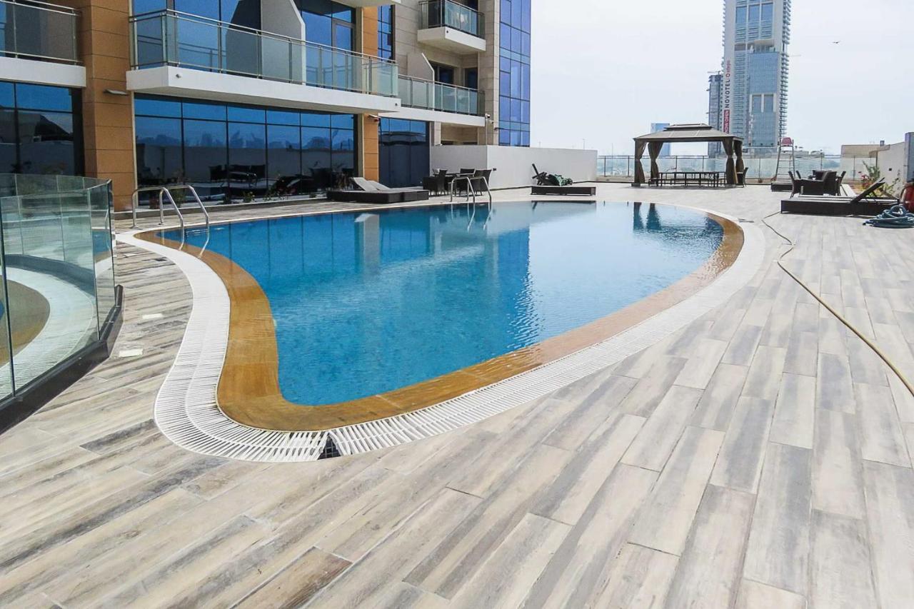 Oyo 860 Studio Apartment, Maya Tower 4, Jumeirah Village Triangle Дубай Экстерьер фото