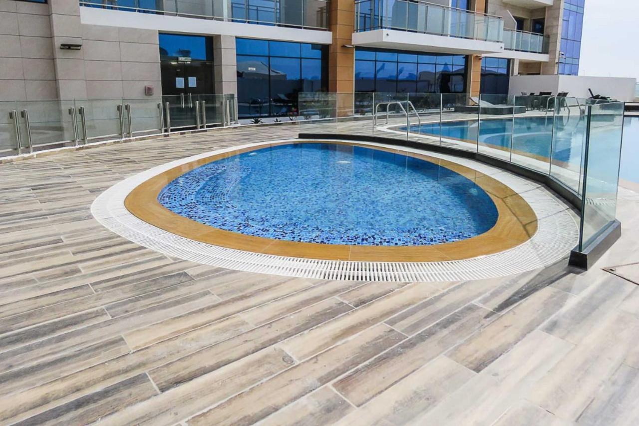 Oyo 860 Studio Apartment, Maya Tower 4, Jumeirah Village Triangle Дубай Экстерьер фото